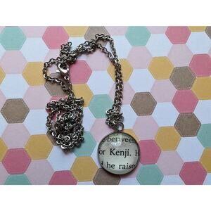 Kenji 20mm pendant necklace made with Shatter Me book pages